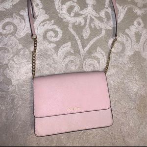 Light pink Michael Kors purse.